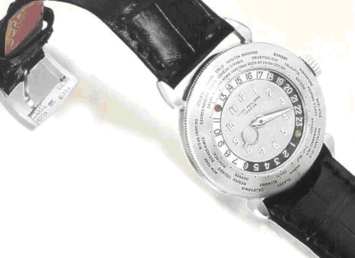 а аукционе Antiquorum в Женеве часы Patek Philippe World Time из платины